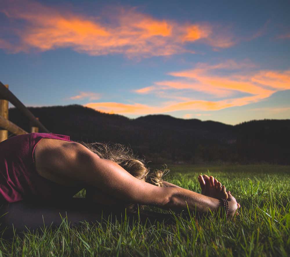 Yoga student in forward bend