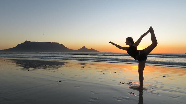 yoga woman beach sunset preview