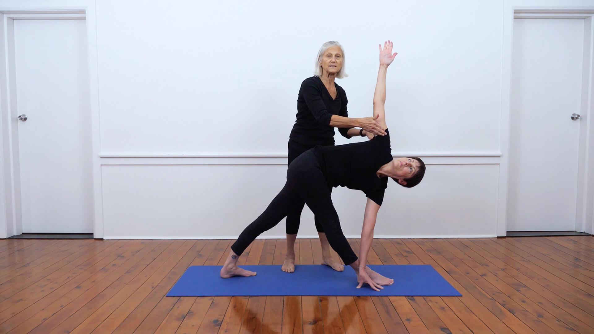 6 Ways to Transition Into Triangle Pose - Yoga Journal