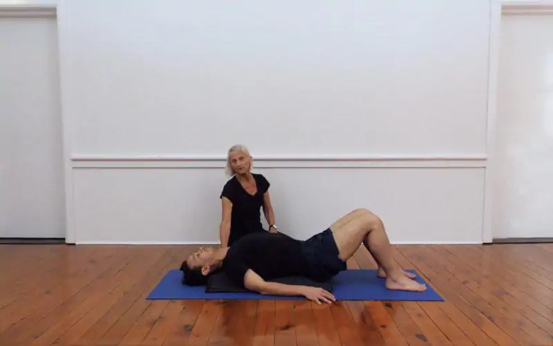 Lying Back Over Support (Step 1) pose