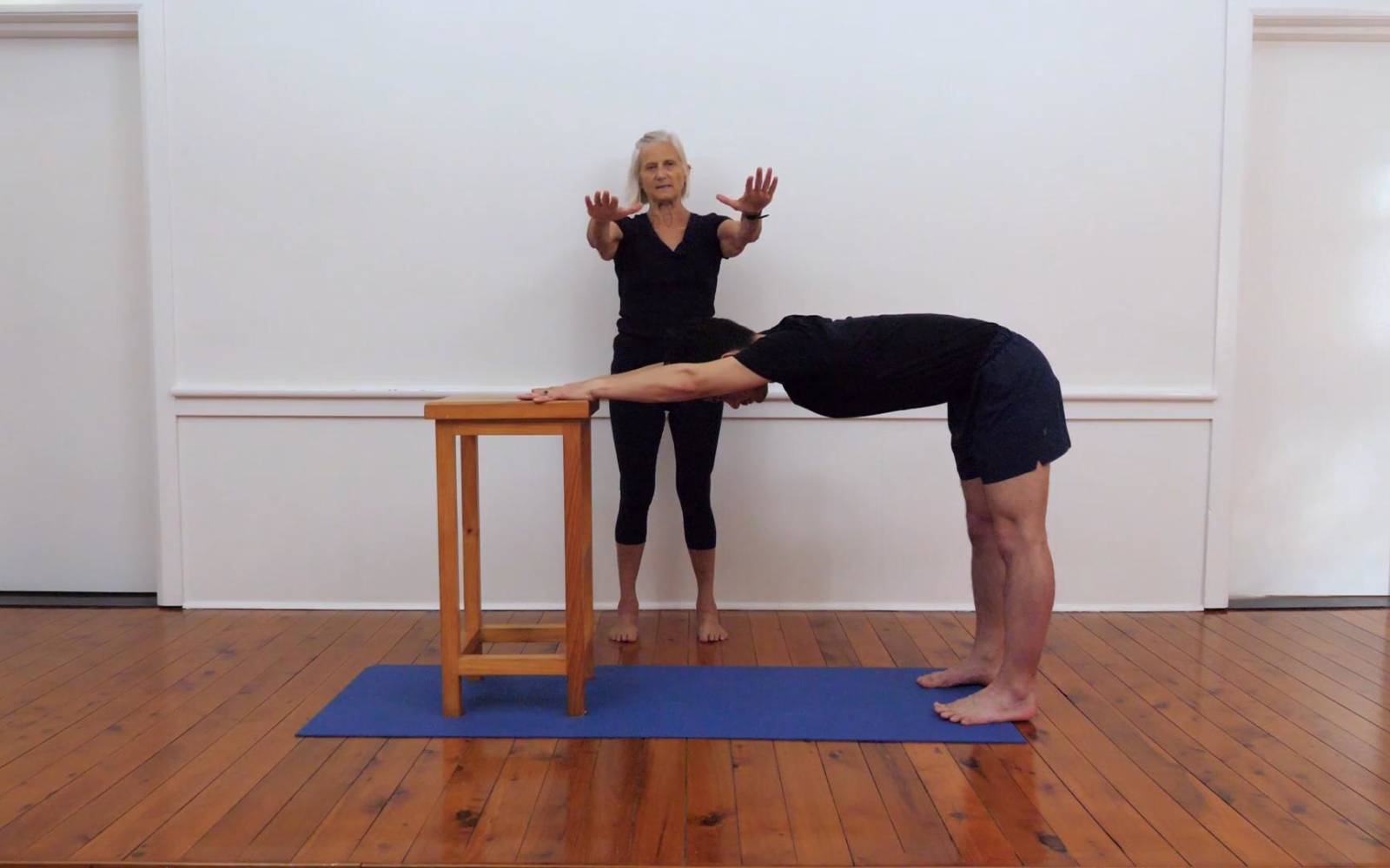 https://media.yogavastu.com/wp-content/uploads/2019/03/6-extended-stretch-over-benchdeep-iyengar-sequence-release-neck-upper-back-1600x1000.jpg