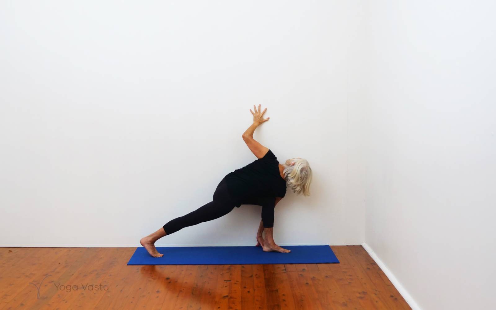 Benefits of Viparita Karani or Legs-Up-The-Wall Pose - Yoga Central
