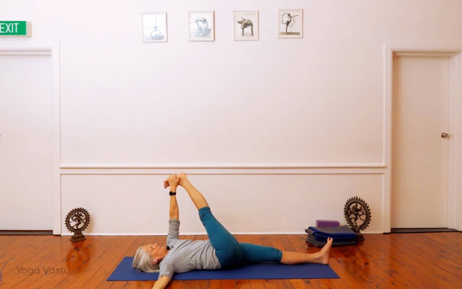 Woman practicing Padmasana at gym - Clay Center for Young Healthy Minds